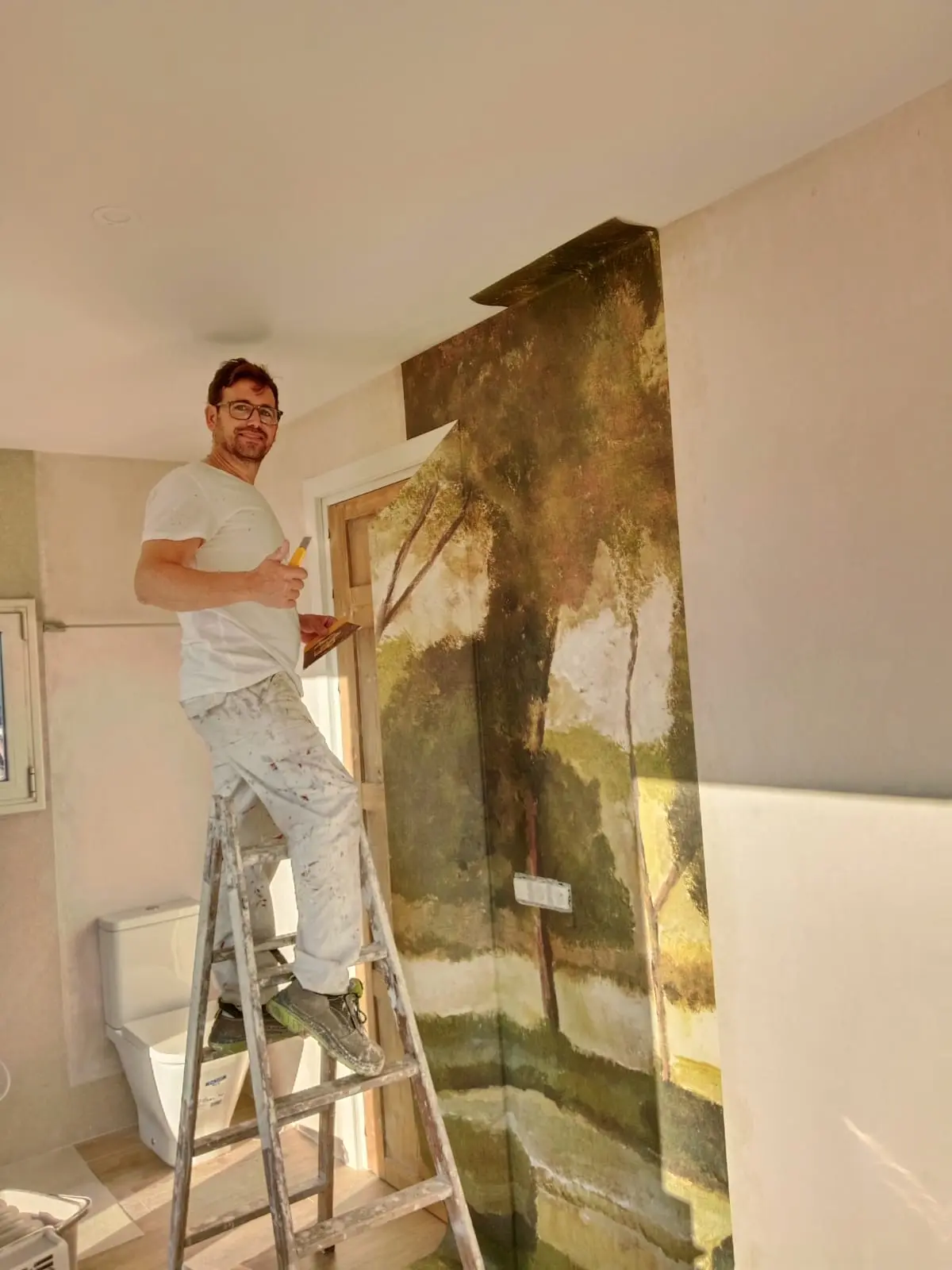 Proceso de pintado de fachada en comunidad de Cádiz capital